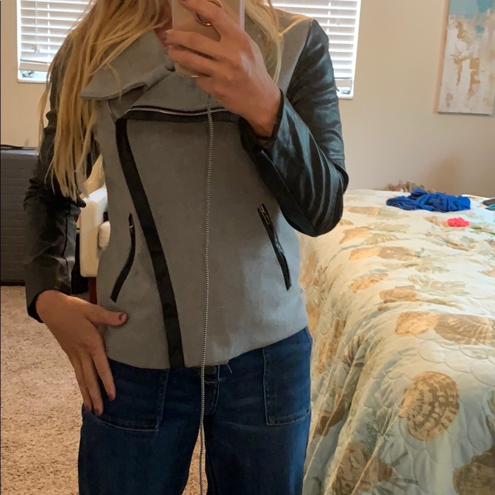 Gray and faux leather jacket